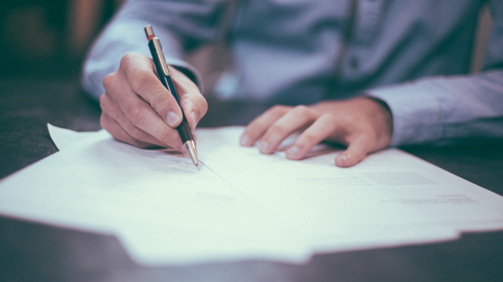 Professional checking a 2026 Skilled Worker salary offer against official requirements